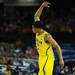 Michigan sophomore Trey Burke attempts to get the crowd hyped up during the first half at the Final Four in Atlanta on Saturday, April 6, 2013. Melanie Maxwell I AnnArbor.com